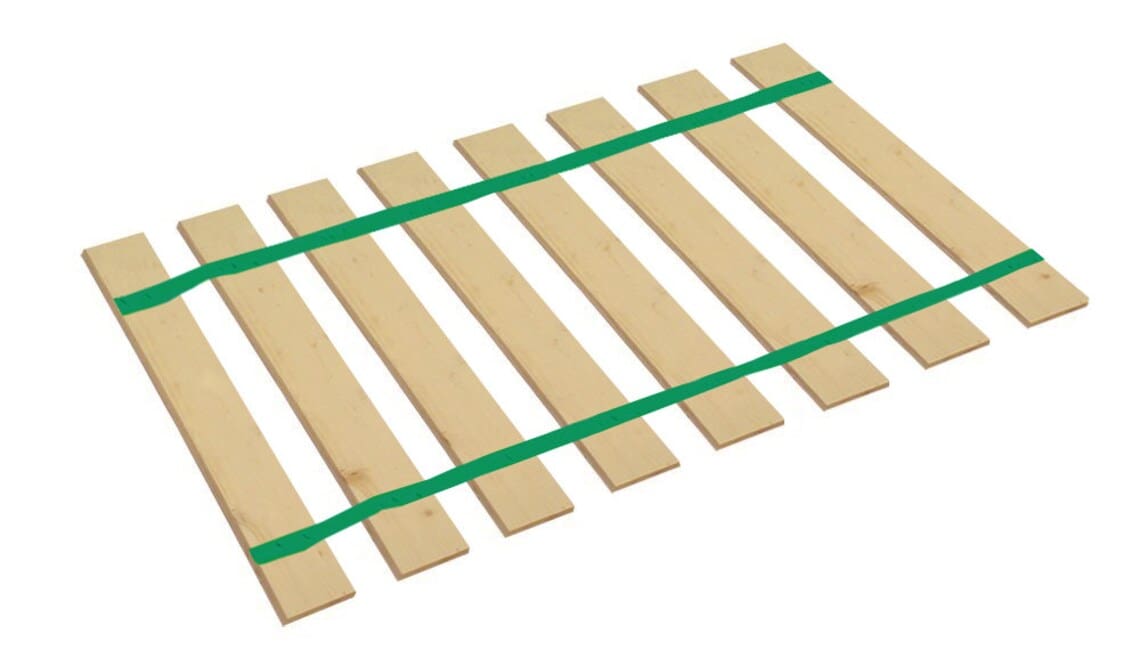 A wooden bed frame with green tape on it.