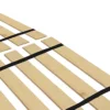 A wooden bed frame with black straps on it.