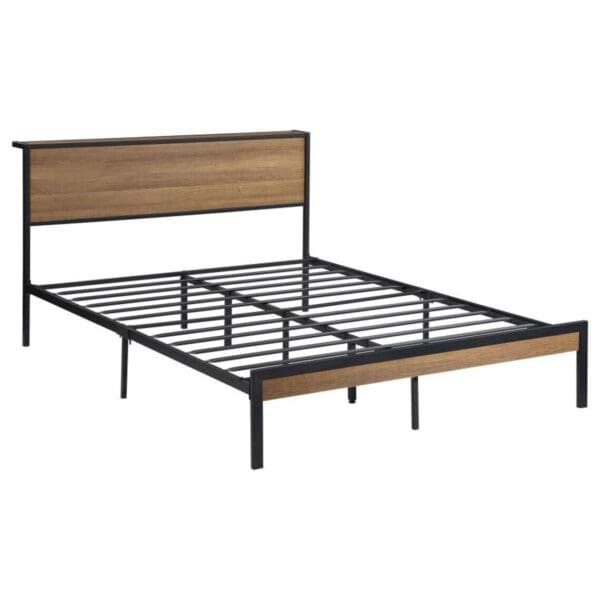 A bed frame with wooden headboard and metal legs.