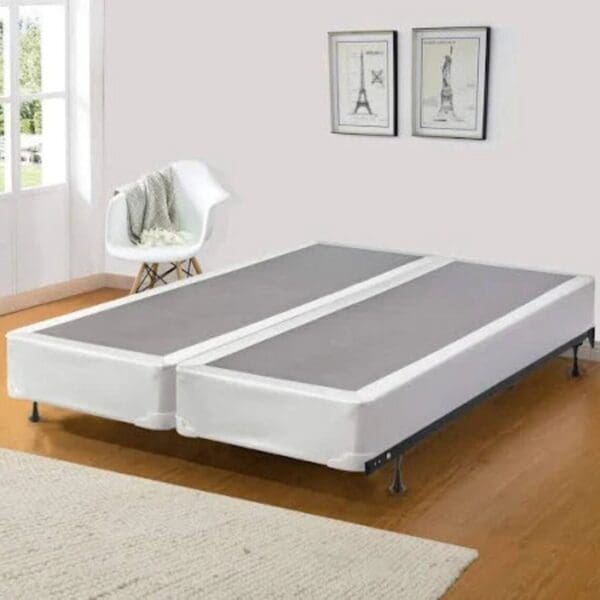 A bed with two separate beds in it