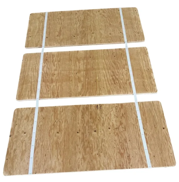 A set of three wooden boards with white lines.