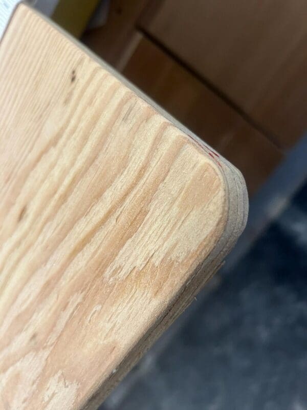 A close up of the wood grain on a table.