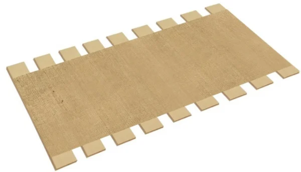 A piece of wood with a strip of cardboard on it.