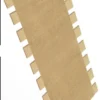 A piece of cardboard with a strip of paper on it.
