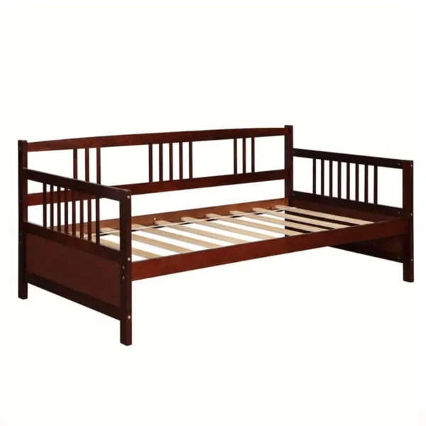 A wooden day bed with slats and rails.