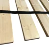 A close up of the wood planks on top of a bed.