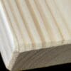 A close up of the wood grain on a piece of wood.