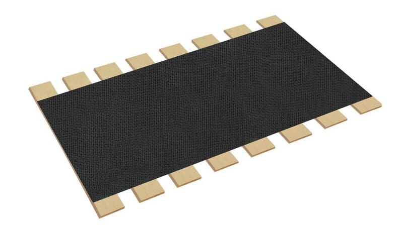 A black mat with wooden blocks on top of it.