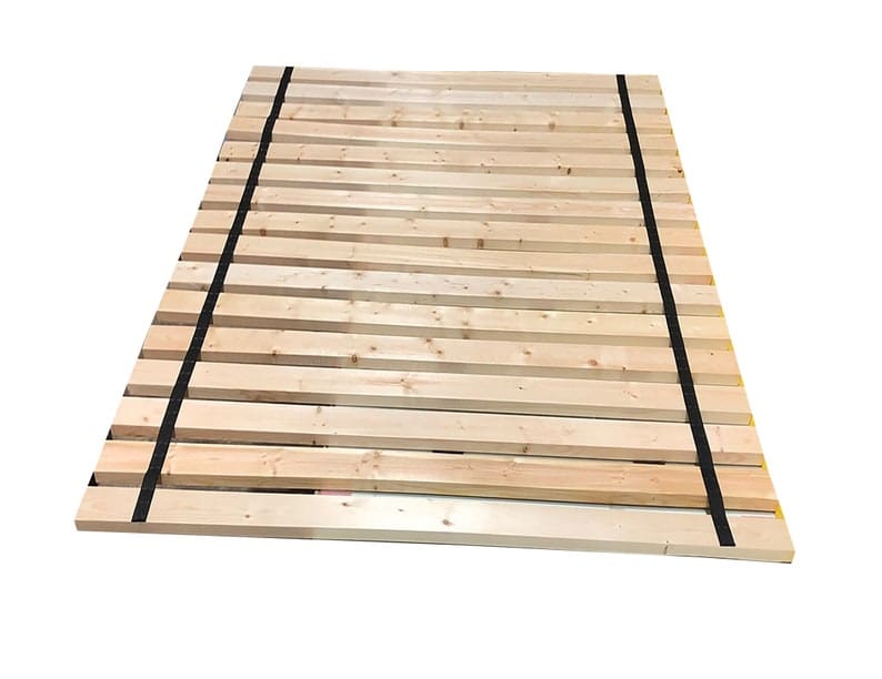 A wooden bed frame with no sheets on it.